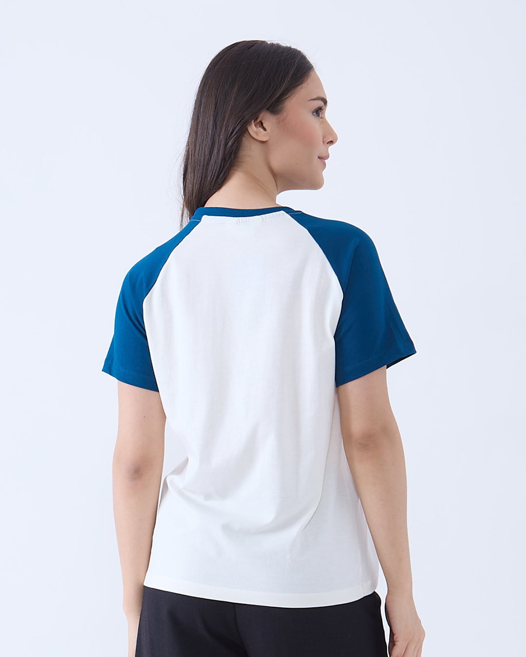 Los Angeles Raglan T-Shirt – white body with blue raglan sleeves, worn by a model