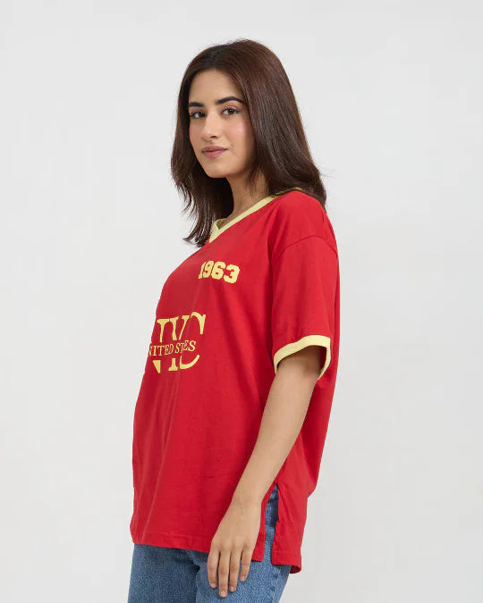 1963 Tap-Out V-Neck Oversize T-Shirt – red oversized tee with yellow 1963 graphic, worn by model