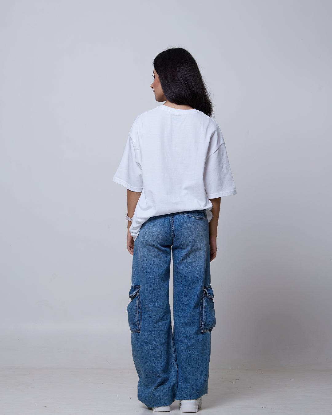 Retro Baby Oversized T-Shirt – white, oversized fit plain tee worn by model from the back.