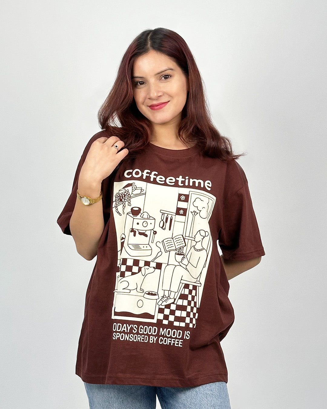 Coffee Time Oversized T-Shirt – brown DKY tee with a coffee-themed graphic print, worn by model.