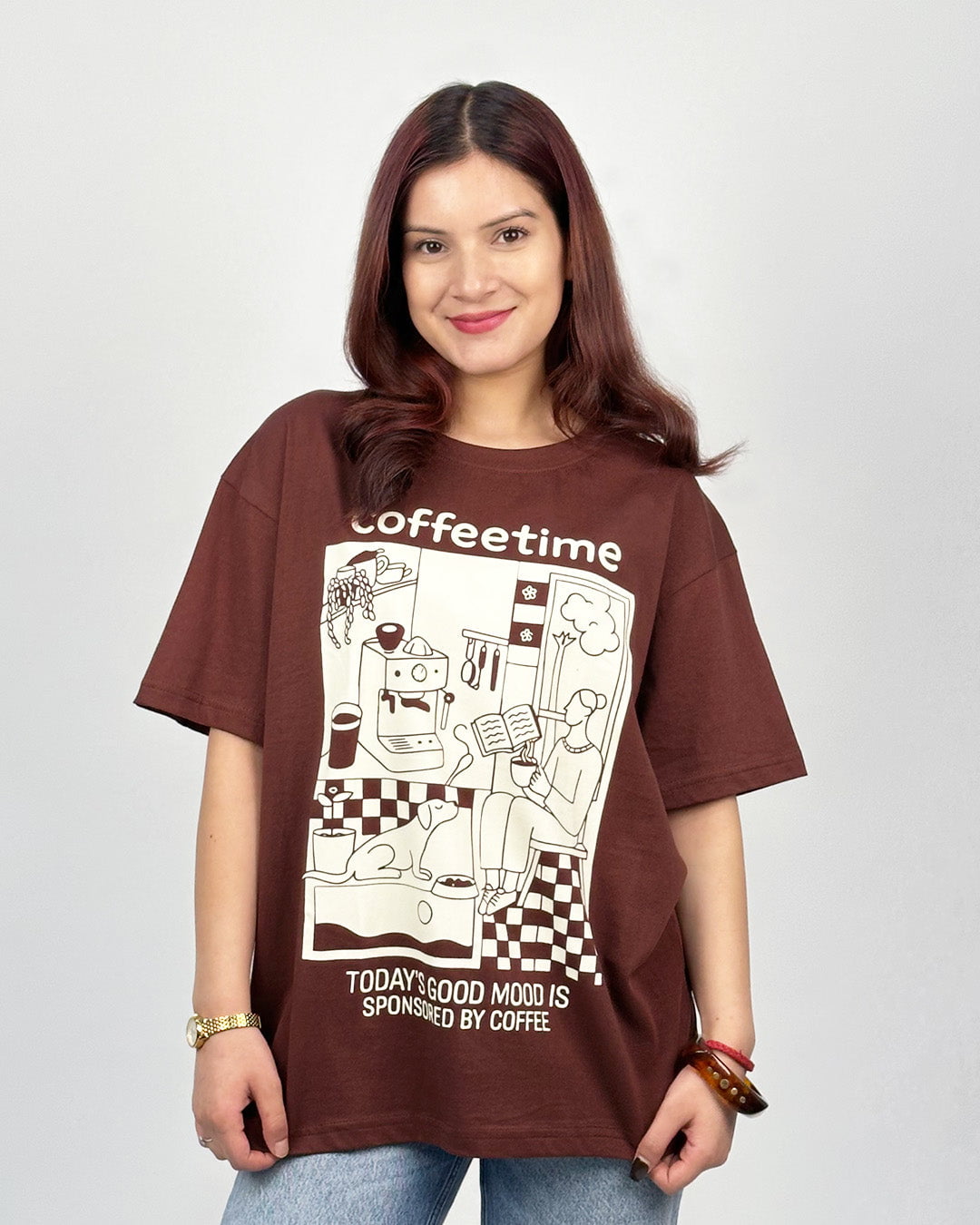 Coffee Time Oversized T-Shirt – brown DKY graphic tee with a coffee-themed illustration, worn by model