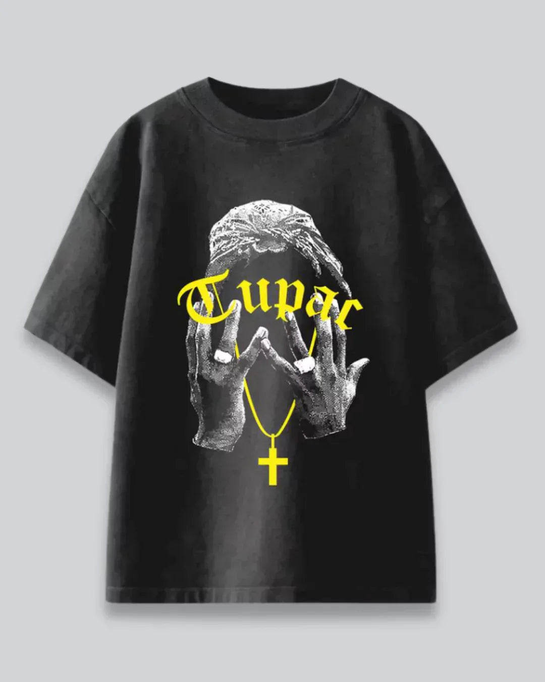 Arlo Tupac Oversized T-Shirt – black graphic tee with yellow Tupac text and necklace print, shown in flat lay
