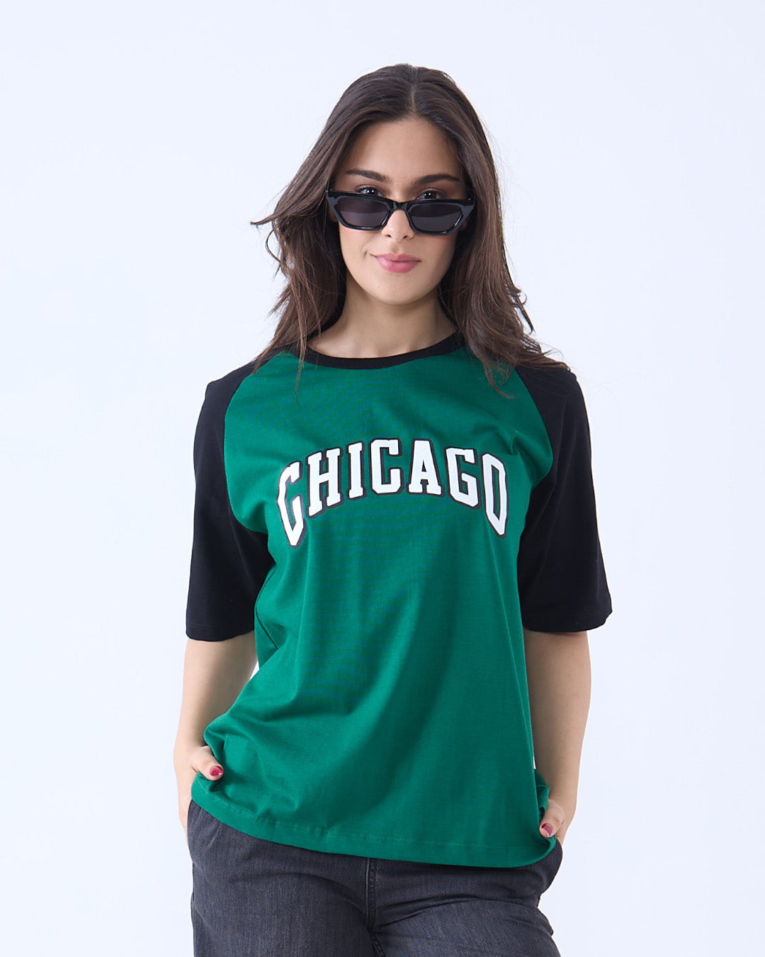 Chicago Raglan Oversize T-Shirt by DKY – green body with black raglan sleeves and CHICAGO graphic, worn by model