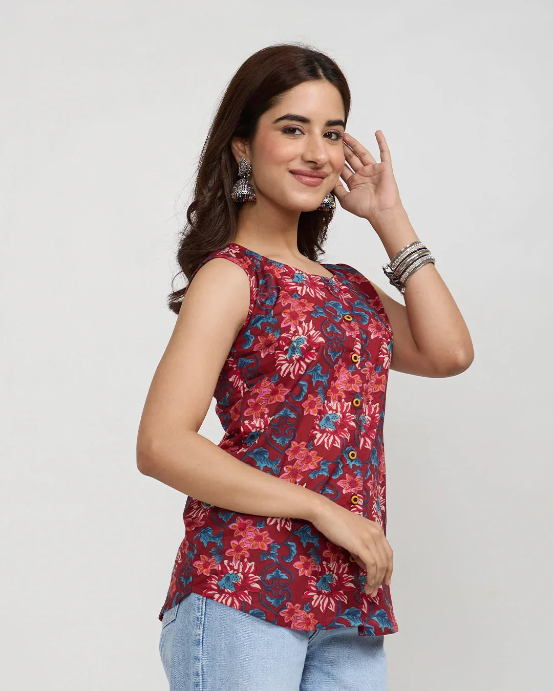 Vintage Muse Button-Down Cotton Top ā maroon printed sleeveless top with floral pattern, worn by model