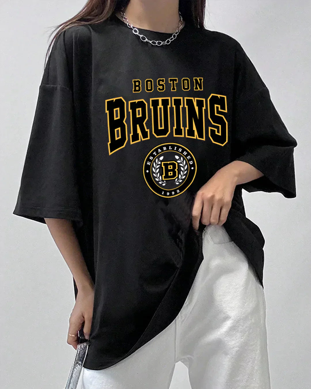 Arlo Boston Bruins Oversized T-Shirt - black oversized graphic tee with Bruins logo and crest, worn by model