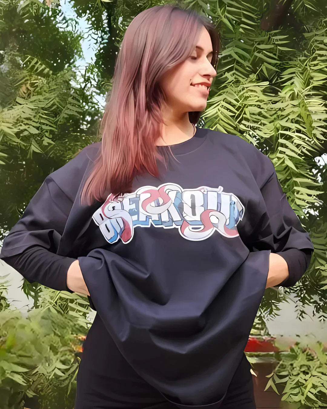 Arlo Breakout Oversized T-Shirt – black oversized graphic tee with bold multicolor logo, worn by model