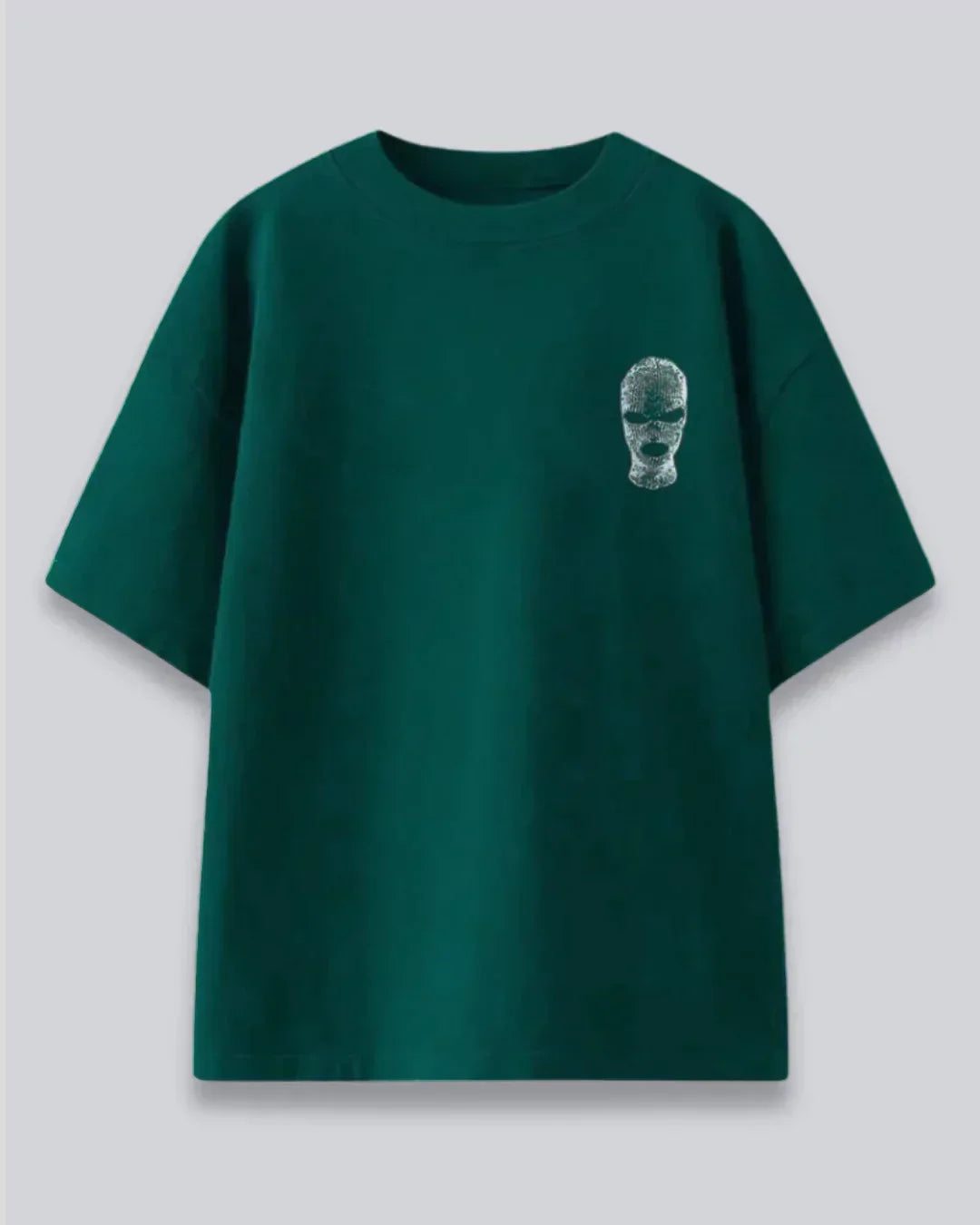 Arlo Jade Gangster Oversized T-Shirt โ dark green 100% cotton graphic tee with a small metallic face, flat lay