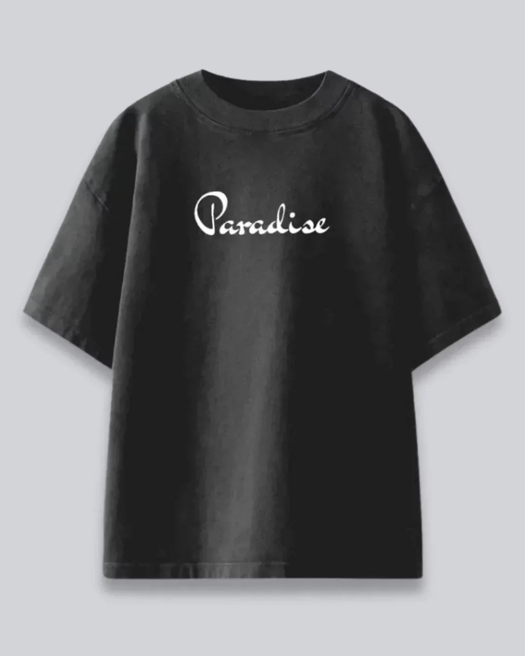 Arlo Paradise Oversized Tshirt – black cotton tee with white Paradise script, flat lay