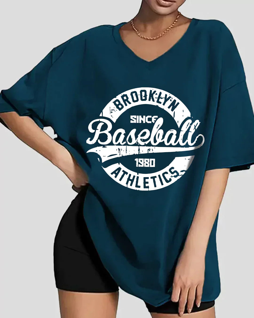 Baseball Petrol Blue V-Neck Oversize T-Shirt - oversized tee with a white circular baseball graphic, worn by model