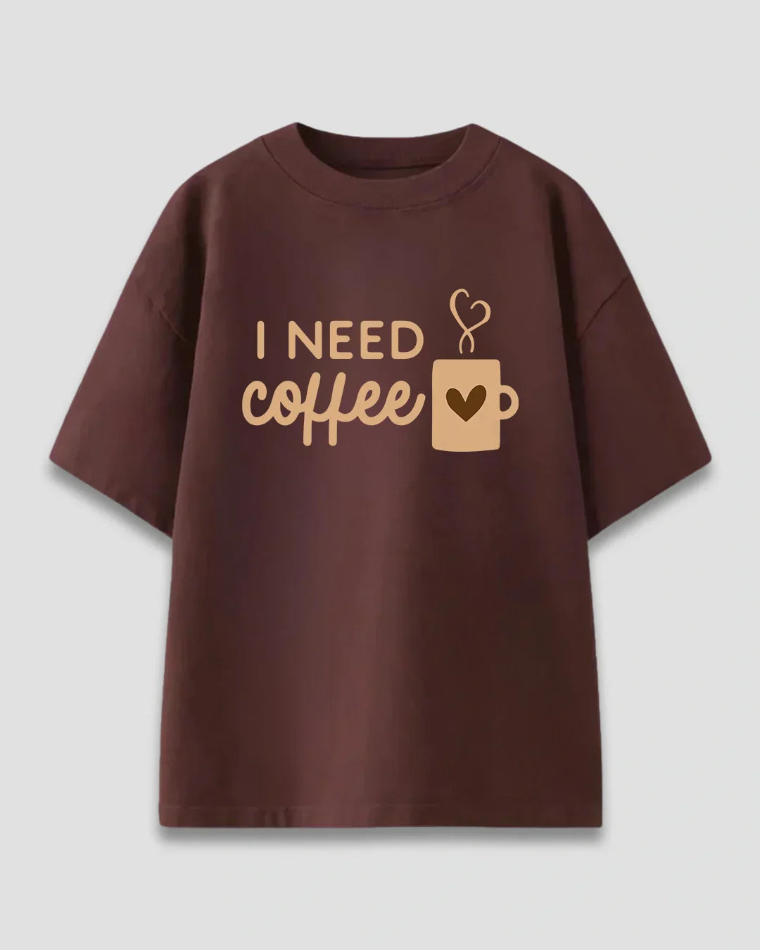 Brown I Need Coffee Oversized T-Shirt – brown tee with I Need Coffee graphic and heart mug, flat lay