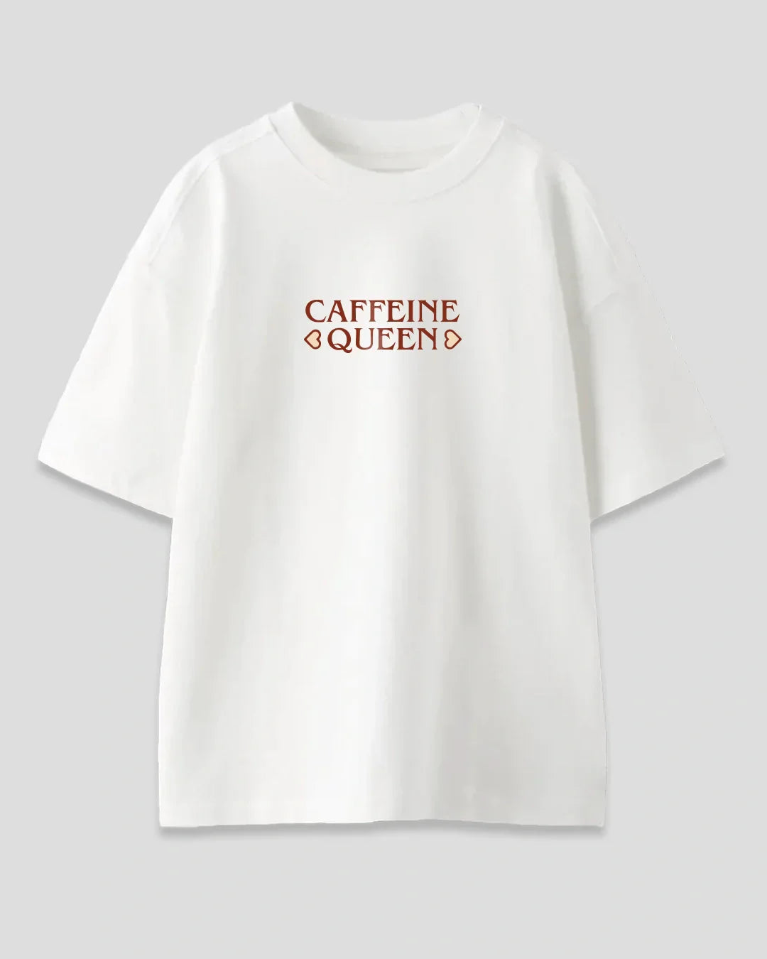 Caffiene Queen Oversized T-Shirt - white oversized graphic tee with CAFFEINE QUEEN lettering, flat lay