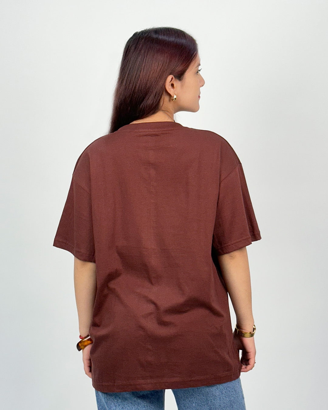 Coffee Time Oversized T-Shirt – brown oversized t-shirt with plain design, worn by model