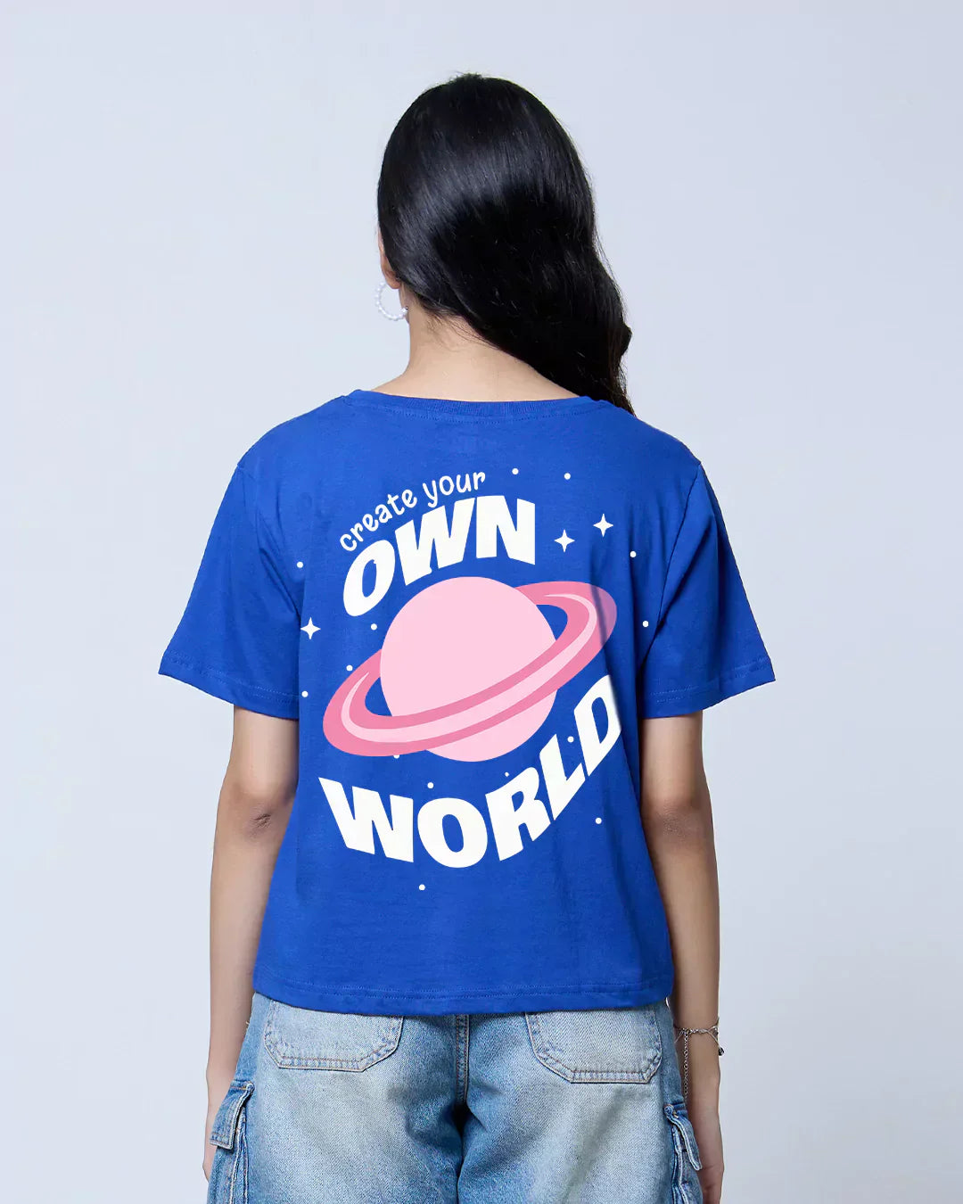 Create Your Own World RB Boxy T-Shirt bright royal blue boxy tee with pink planet print, back view on model