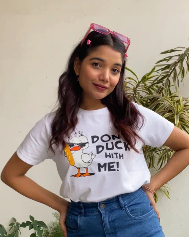 Don't Duck With Me T-Shirt – white regular tee with DKY graphic duck print, worn by model