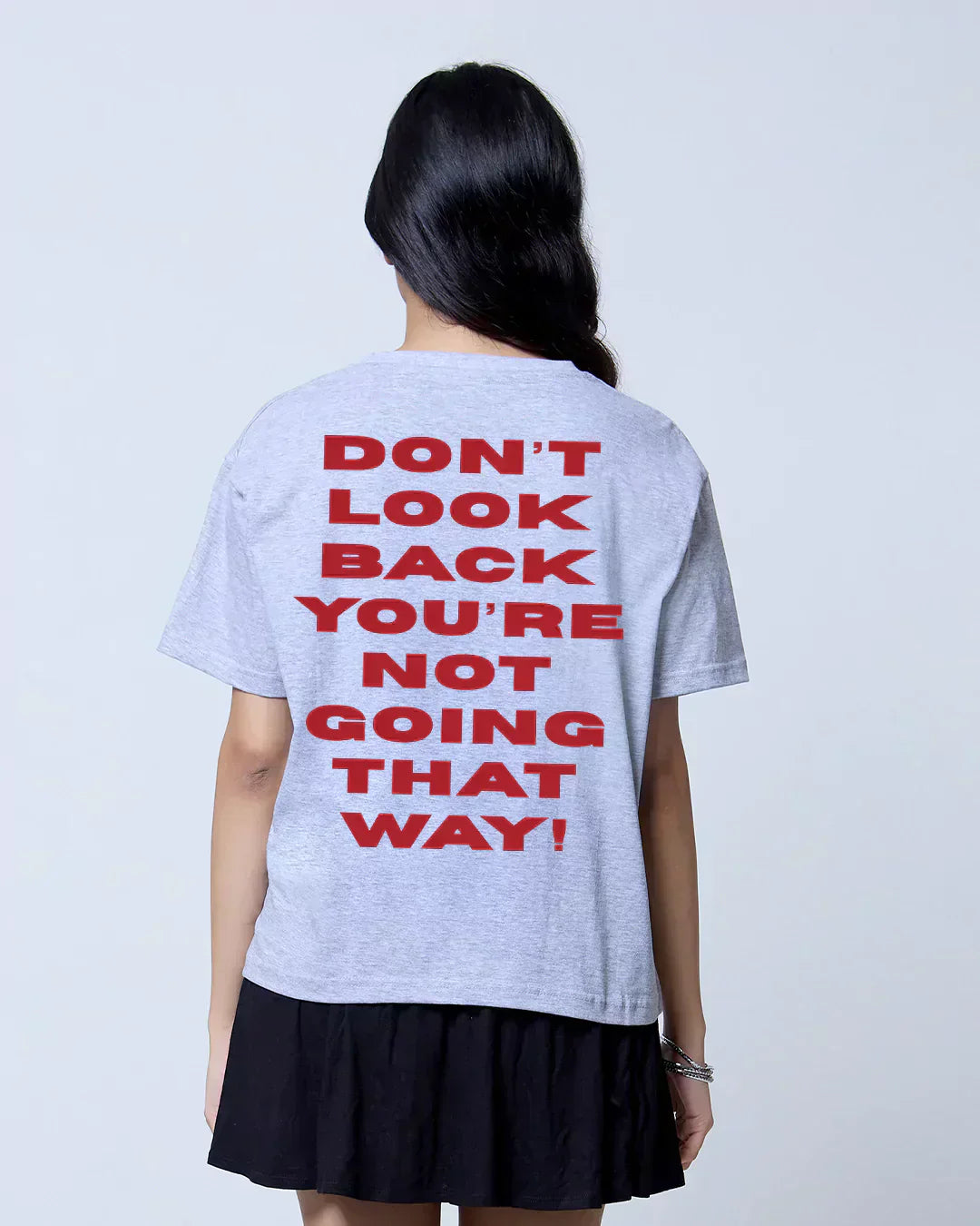 Dont Look Back Boxy Oversize T-Shirt – grey tee with bold red back print, worn by model