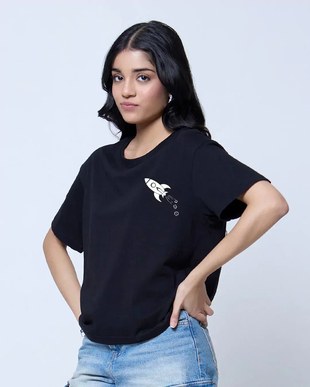 Fly To The Moon Boxy Oversize T-Shirt – black boxy tee with a white rocket graphic on the chest, worn by a model