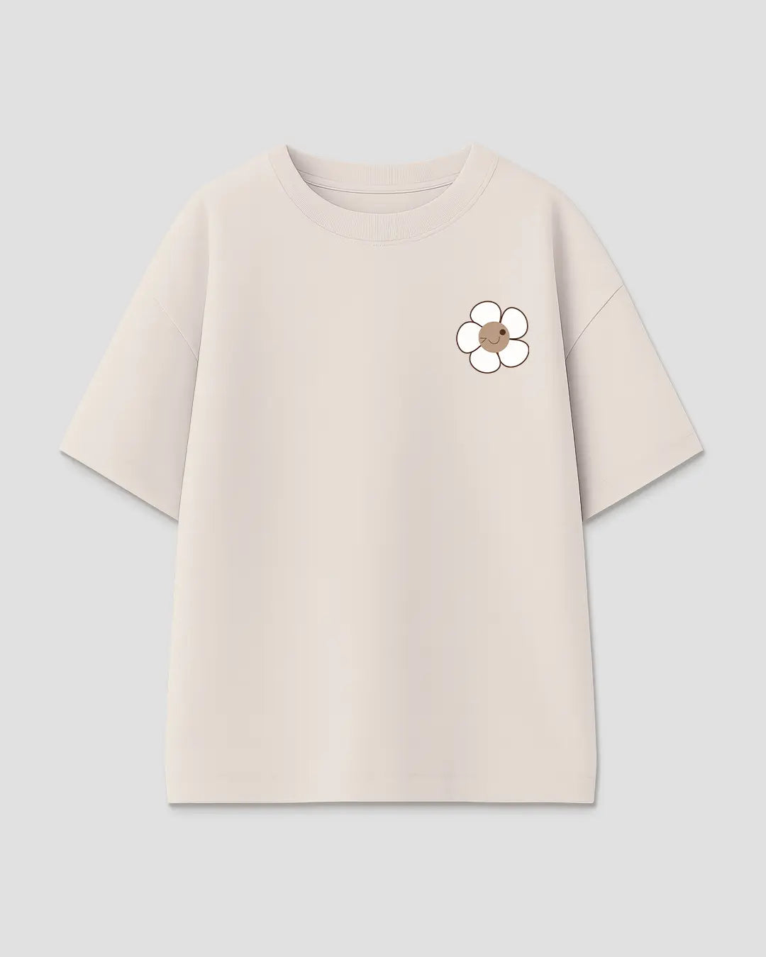 Good Things Are Coming Oversized T-Shirt – beige oversized tee with a small daisy graphic on the chest, DKY