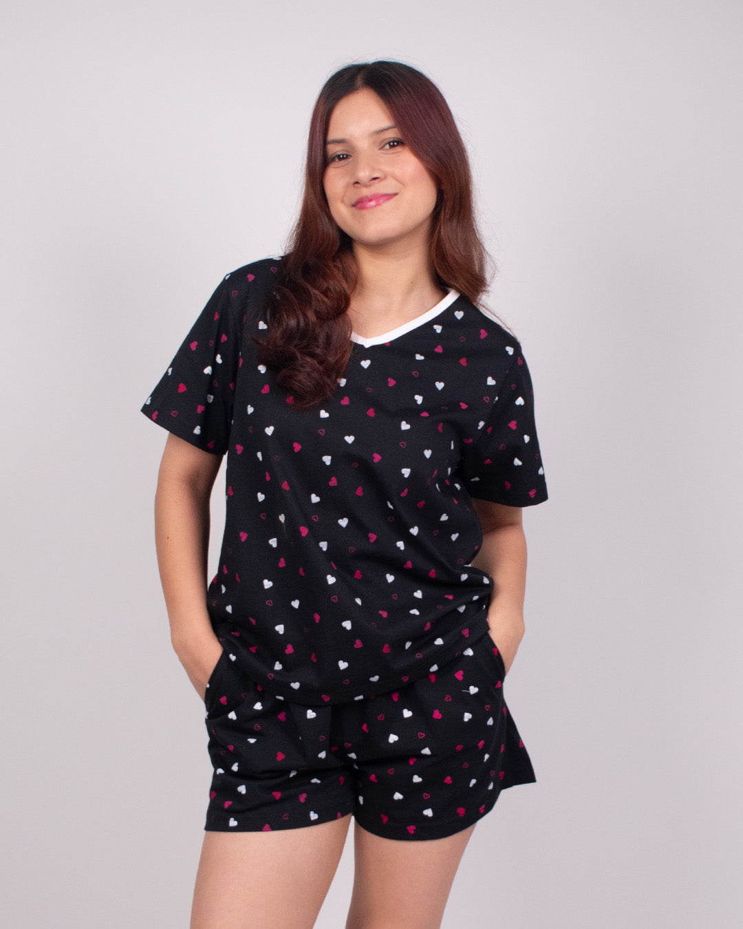 Heart Cotton Shorts Set by DKY ā black with white and pink heart prints, relaxed-fit top and shorts, worn by model