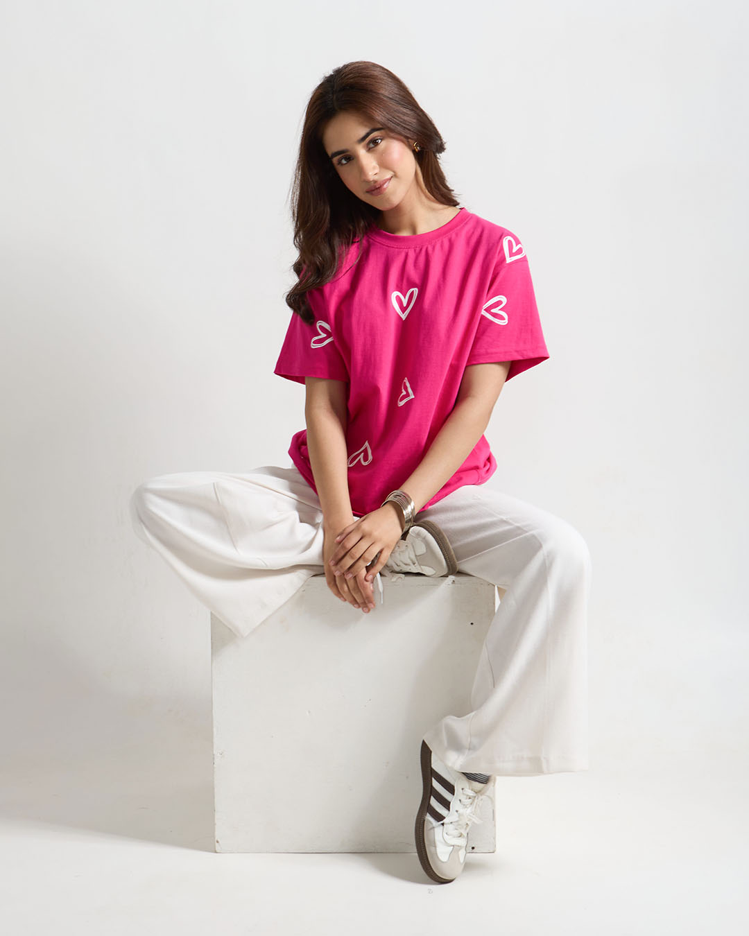 Hot Pink Lover Oversized T-Shirt by DKY - hot pink graphic tee with white heart prints, worn by model