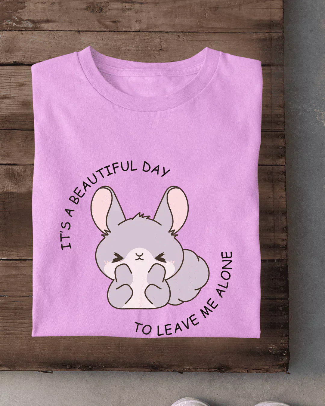 Its A Beautiful Day T-Shirt - pink regular tee with bunny graphic, shown in flat lay