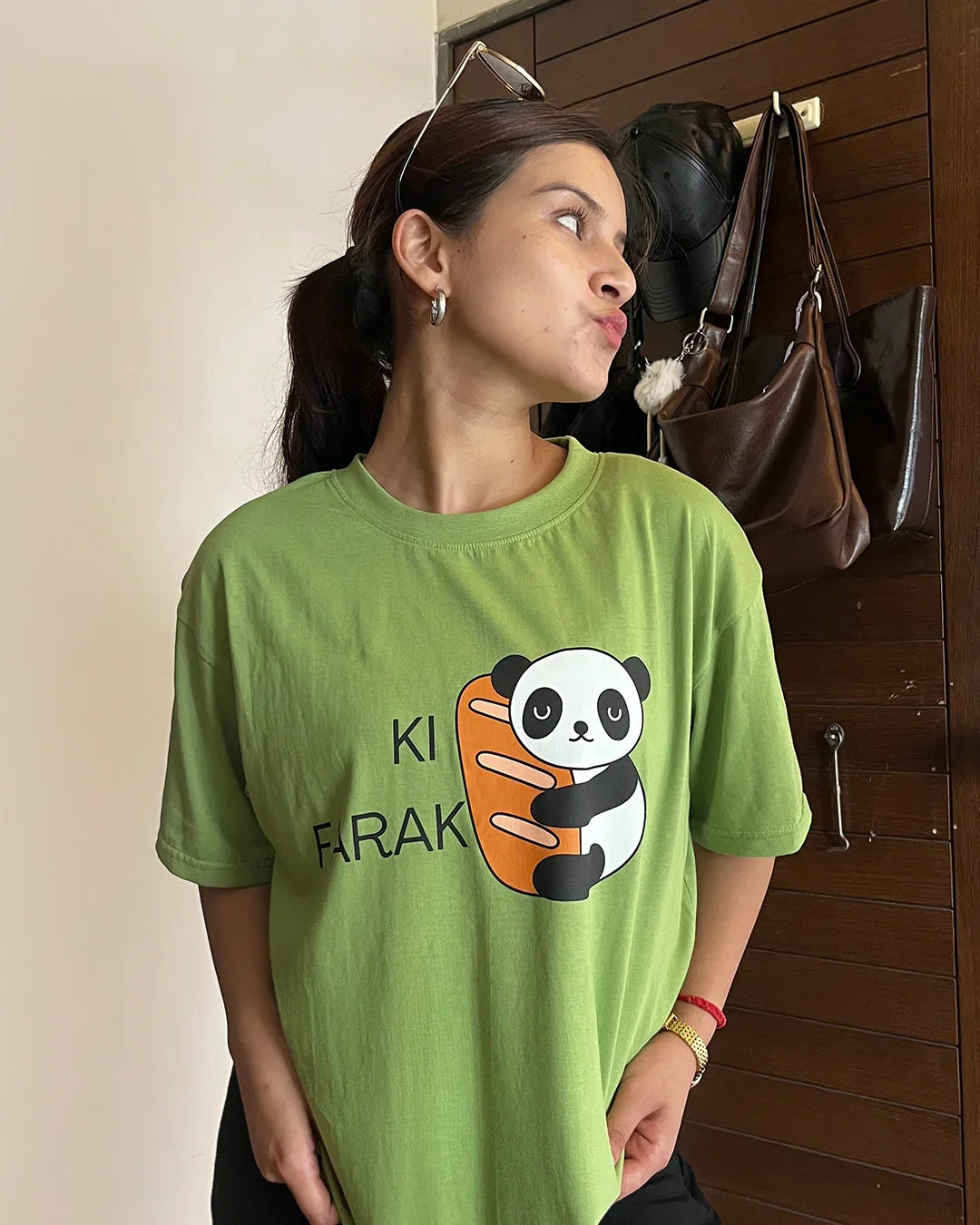 Ki Farak Panda Oversized T-Shirt in green by DKY with panda graphic on front, worn by model