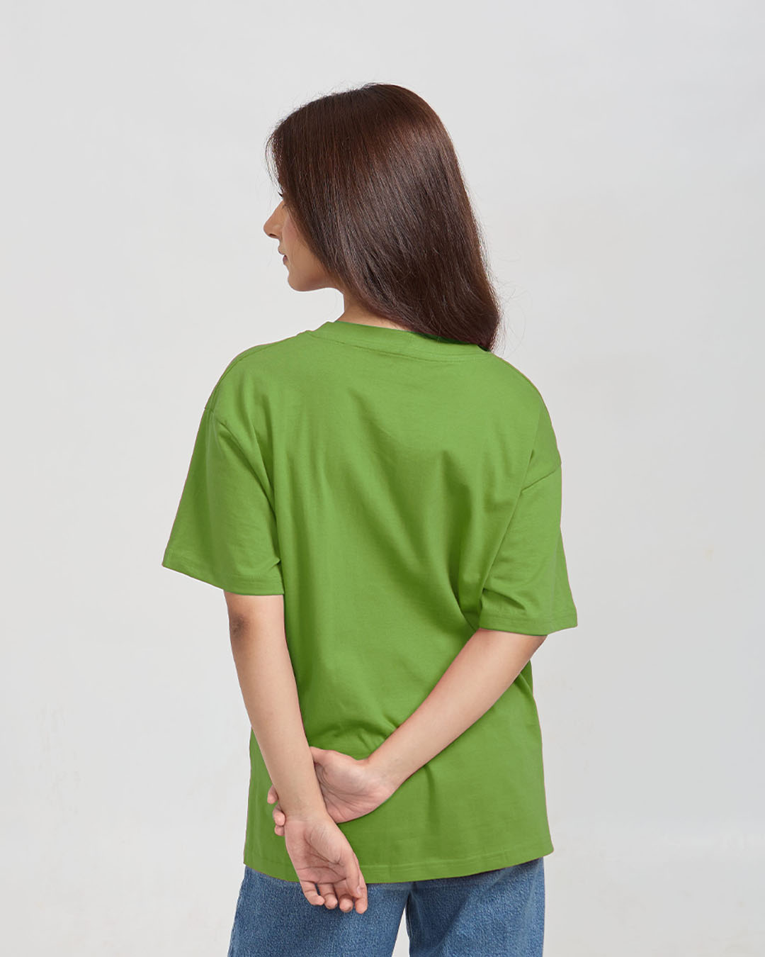 Kiwi Green Plain V-Neck Oversize T-Shirt ā oversized V-neck tee in plain design, worn by model (back view)