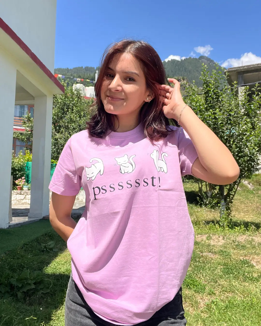 Lilac Pssst T-Shirt – lilac relaxed fit regular tee graphic with three white cats and psssst! text, worn by model