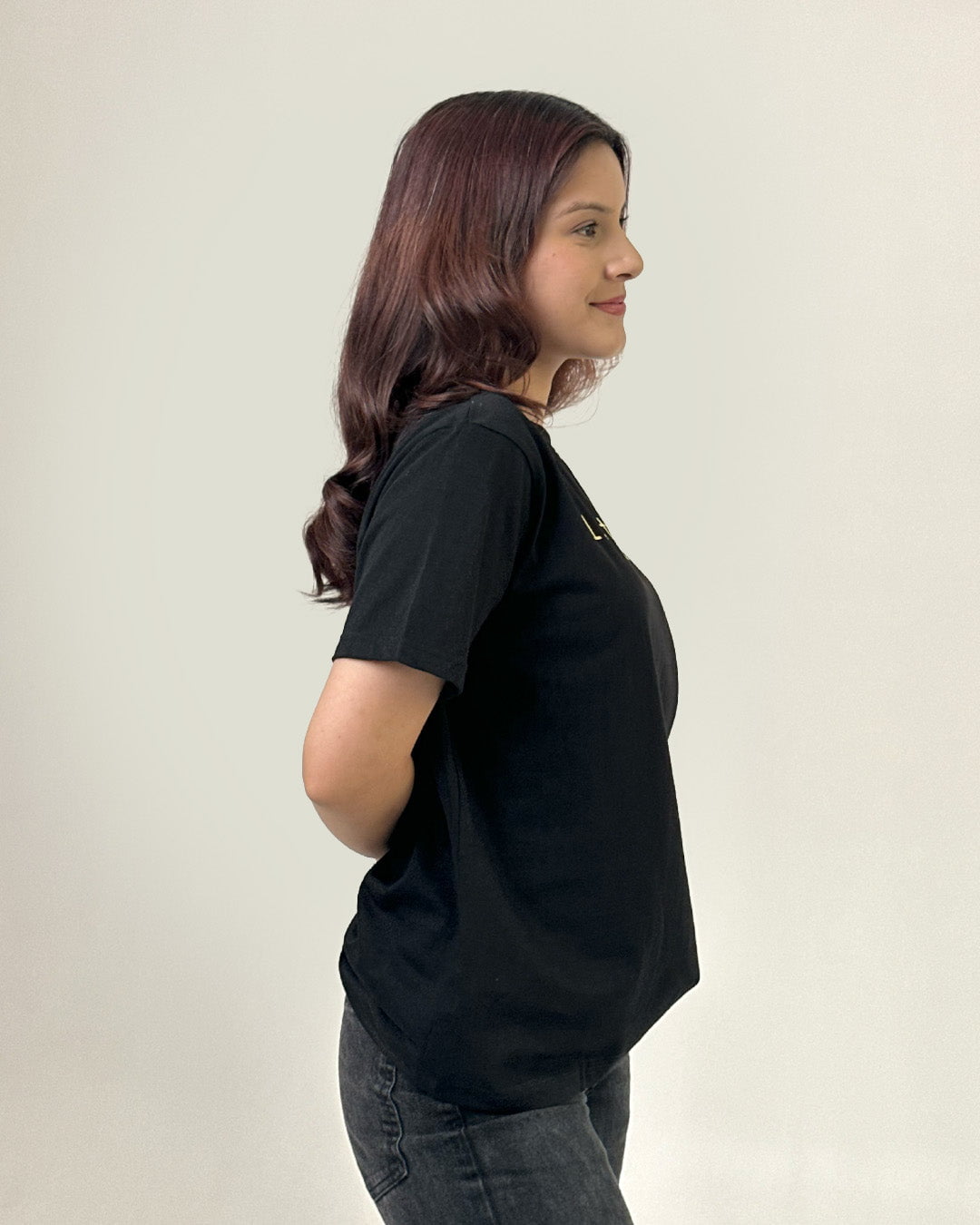 Literally T-Shirt โ black DKY regular tee with a small chest logo, relaxed fit, worn by model