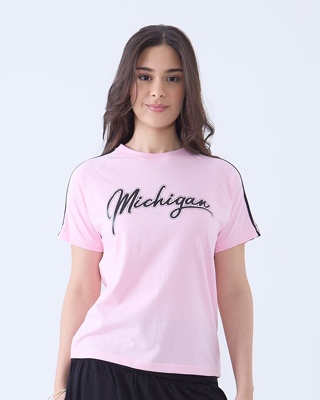 Michigan Curve T-Shirt – pink regular tee with Michigan script graphic, worn by model