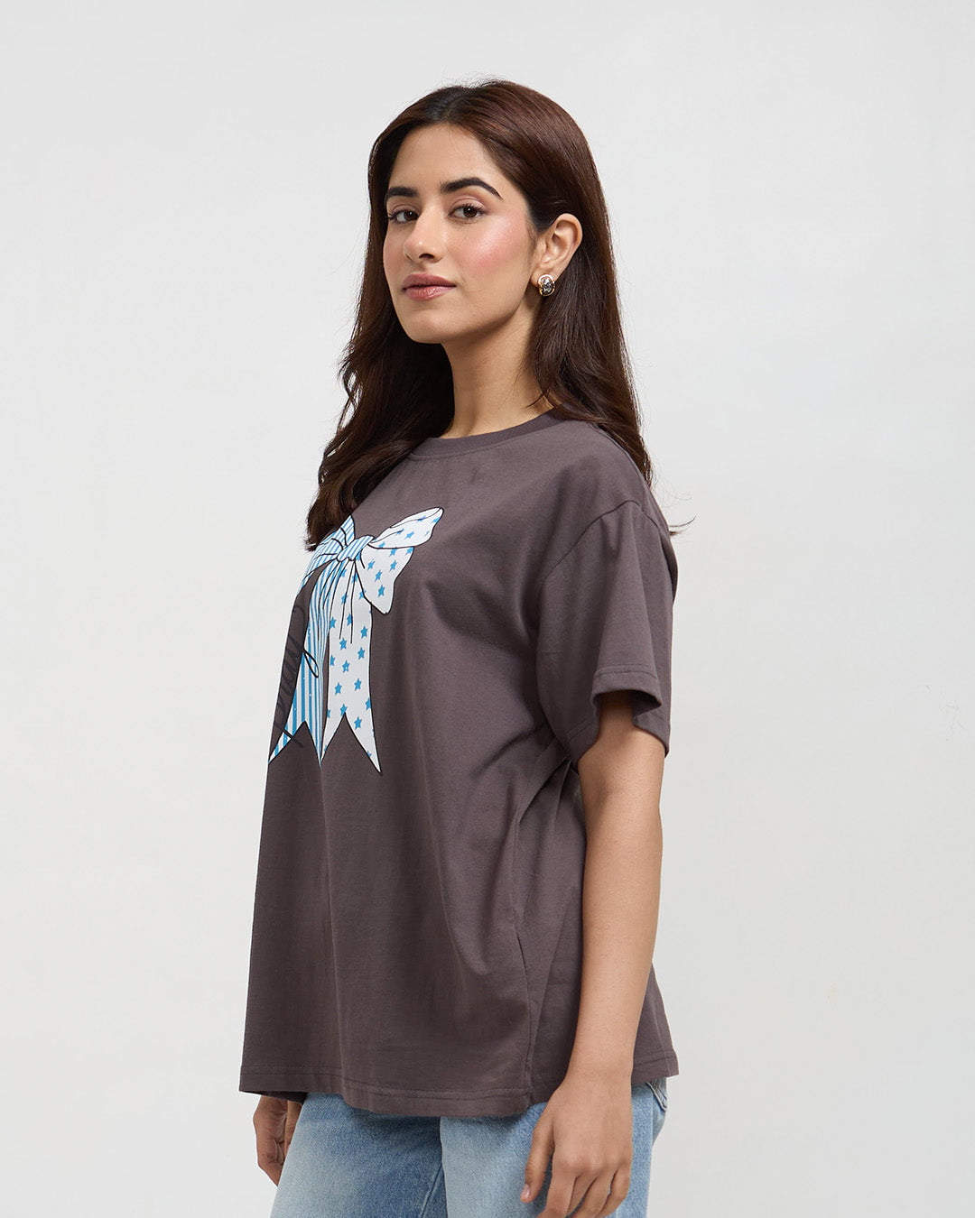 Pray Oversized T-shirt - charcoal gray DKY tee with a blue bow graphic, worn by model