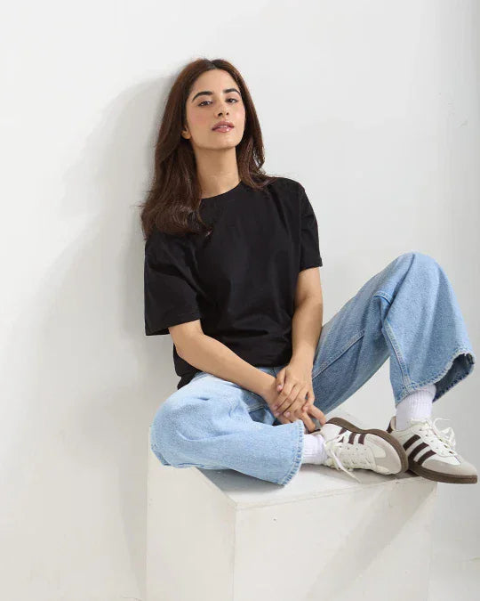 RB Black Plain Oversized T-Shirt - black oversized basic shirt with plain design, worn by model in jeans