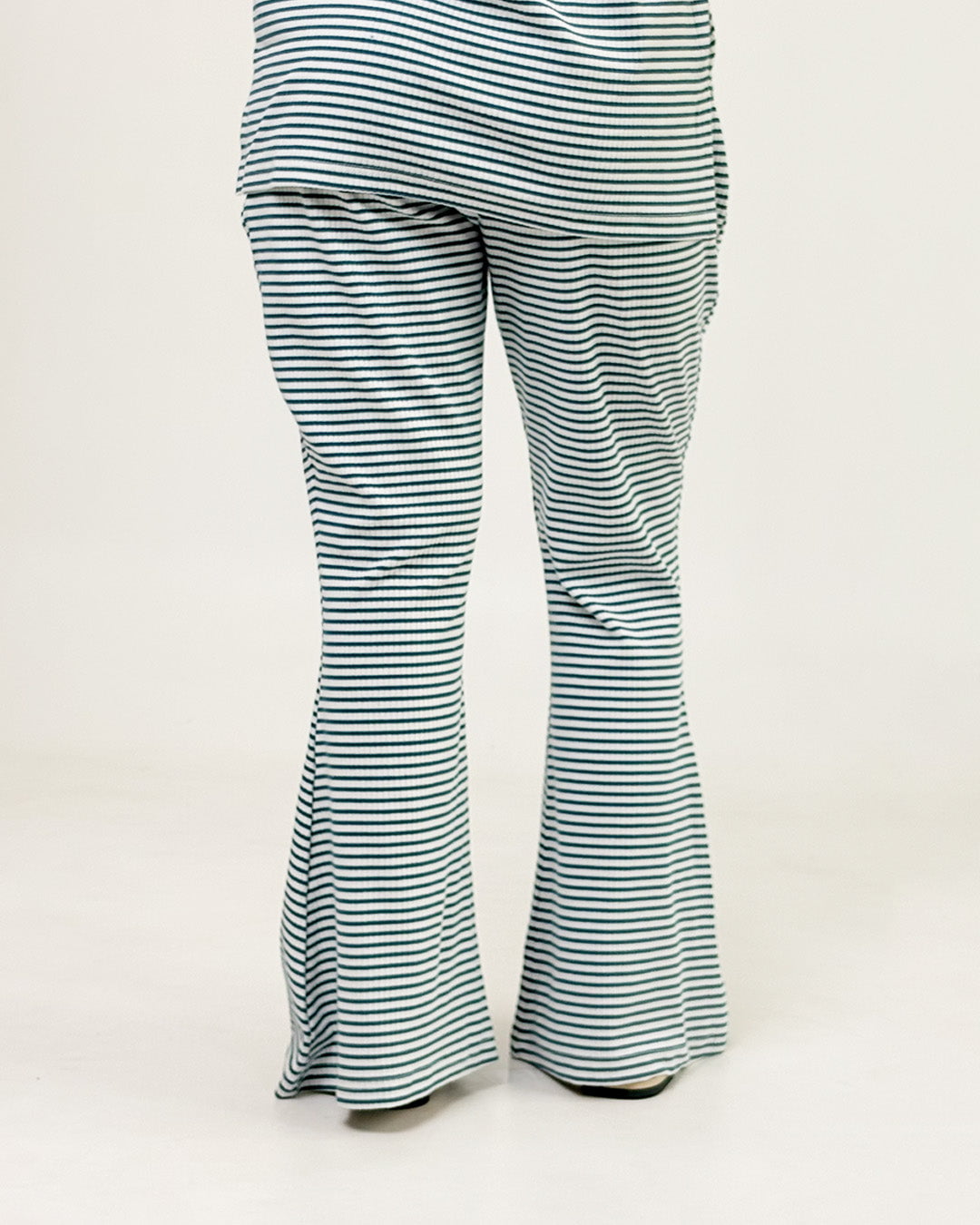 Teal Blue Ribbed Co-Ord Set by DKY - teal and navy striped ribbed pants with a flared fit, worn by model