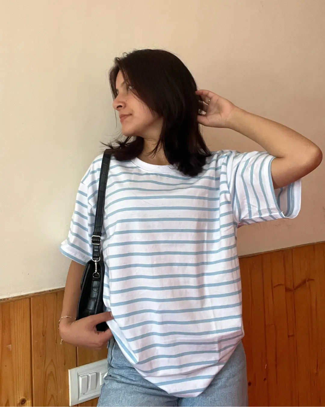 W&B Stripe Oversized T-Shirt – white with light blue stripes, oversized fit, worn by model