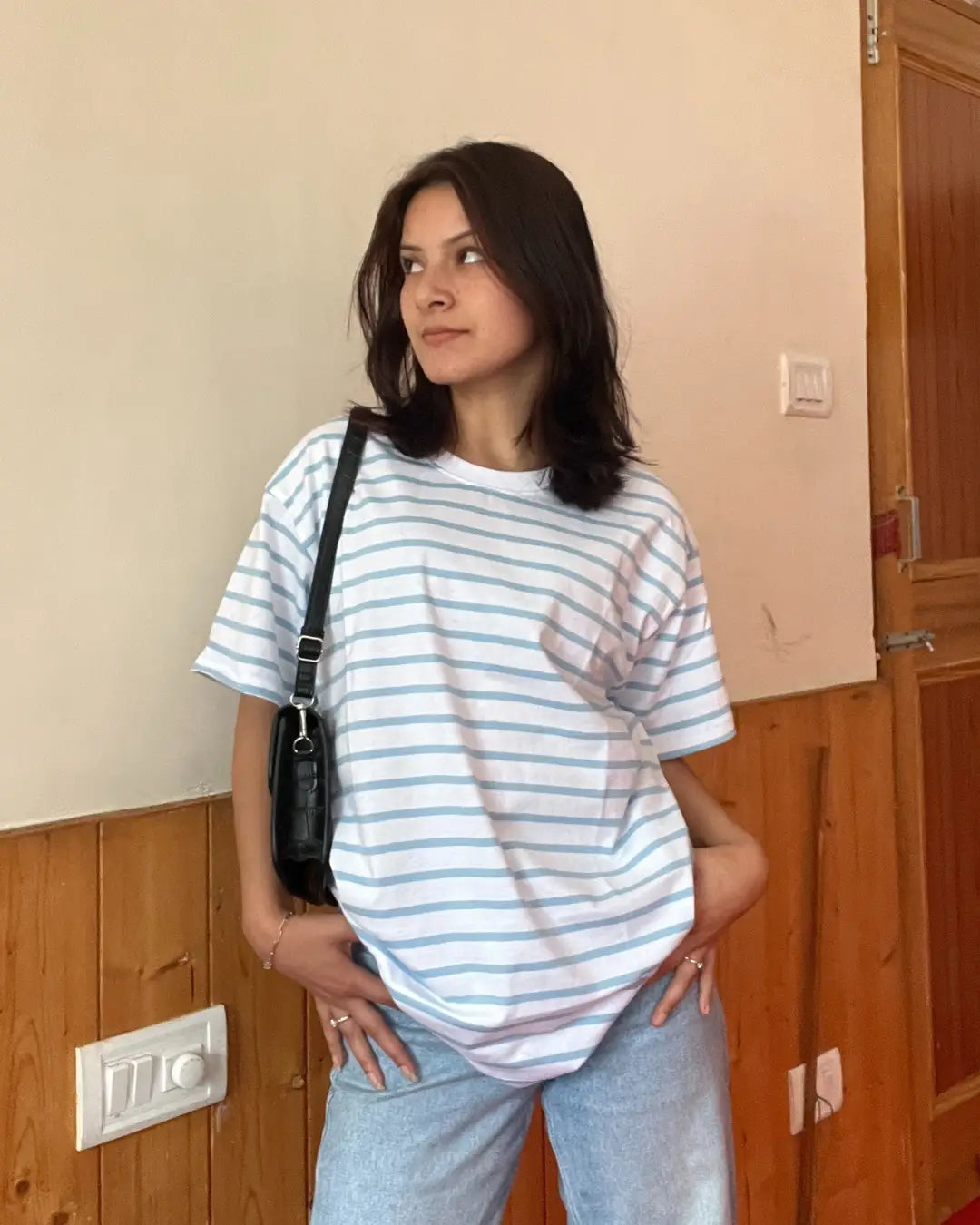 W&B Stripe Oversized T-Shirt – white with light blue stripes, oversized fit worn by model