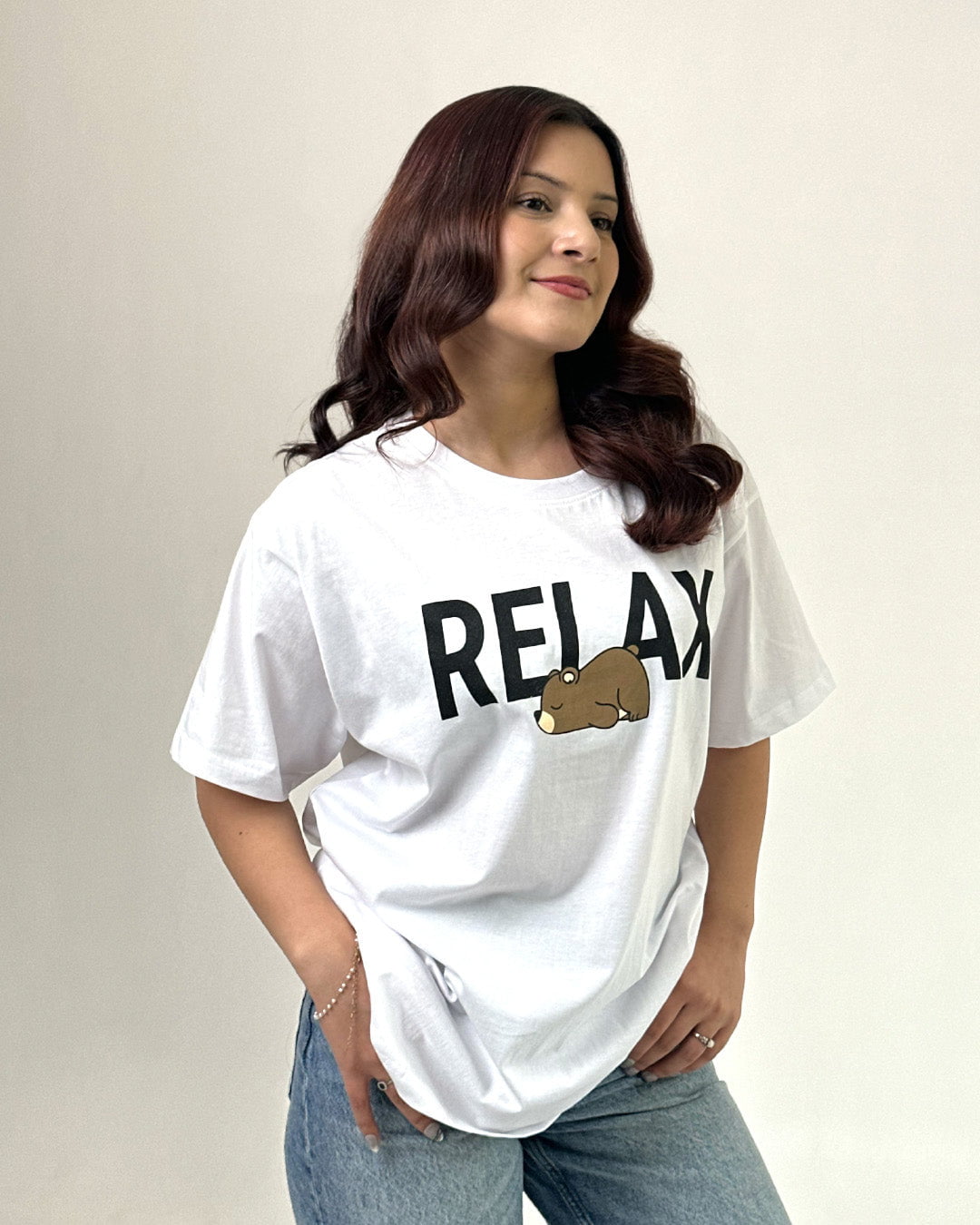 White Relax Oversized T-Shirt - oversized graphic tee with RELAX lettering and bear illustration, worn by model