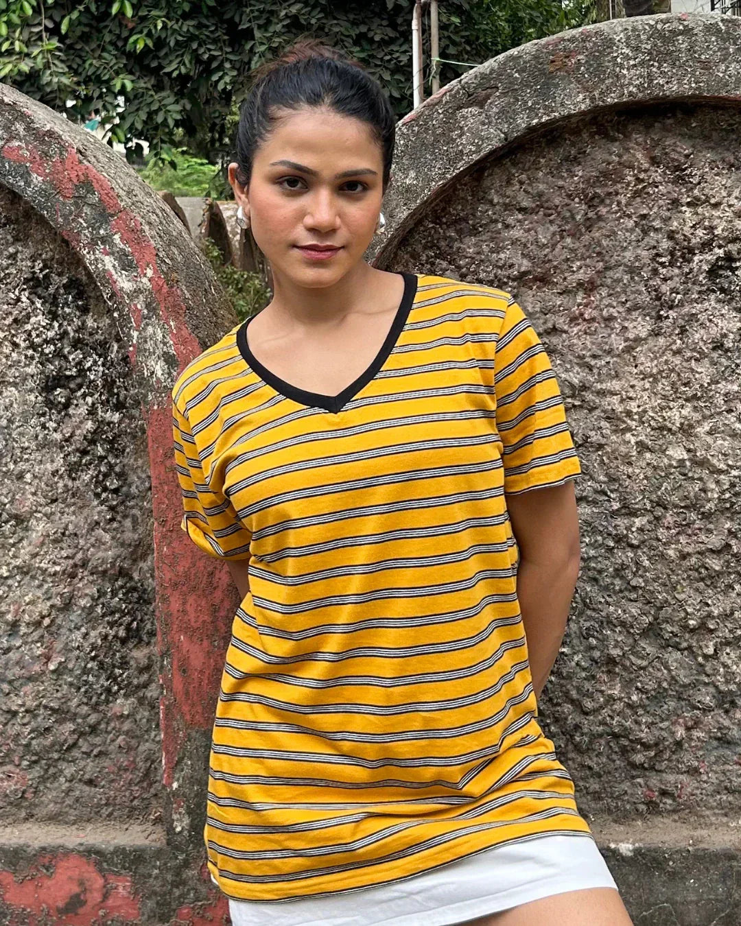 Yellow Stripe V-Neck T-Shirt - yellow and black striped V-neck tee with a relaxed fit, worn by model