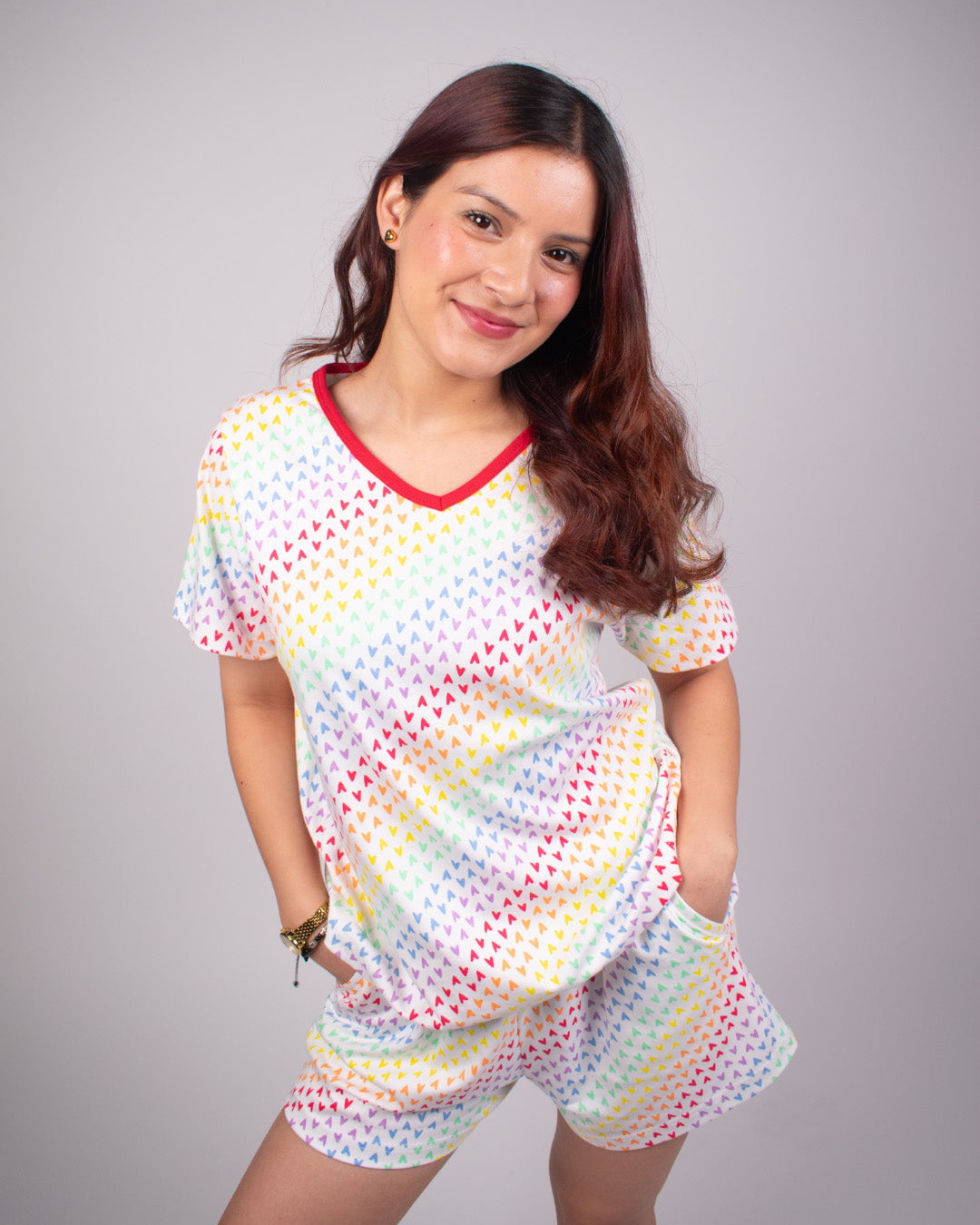 Rainbow Cotton Shorts Set – multicolored triangle print, short-sleeve top with red neckline and matching shorts, worn by model