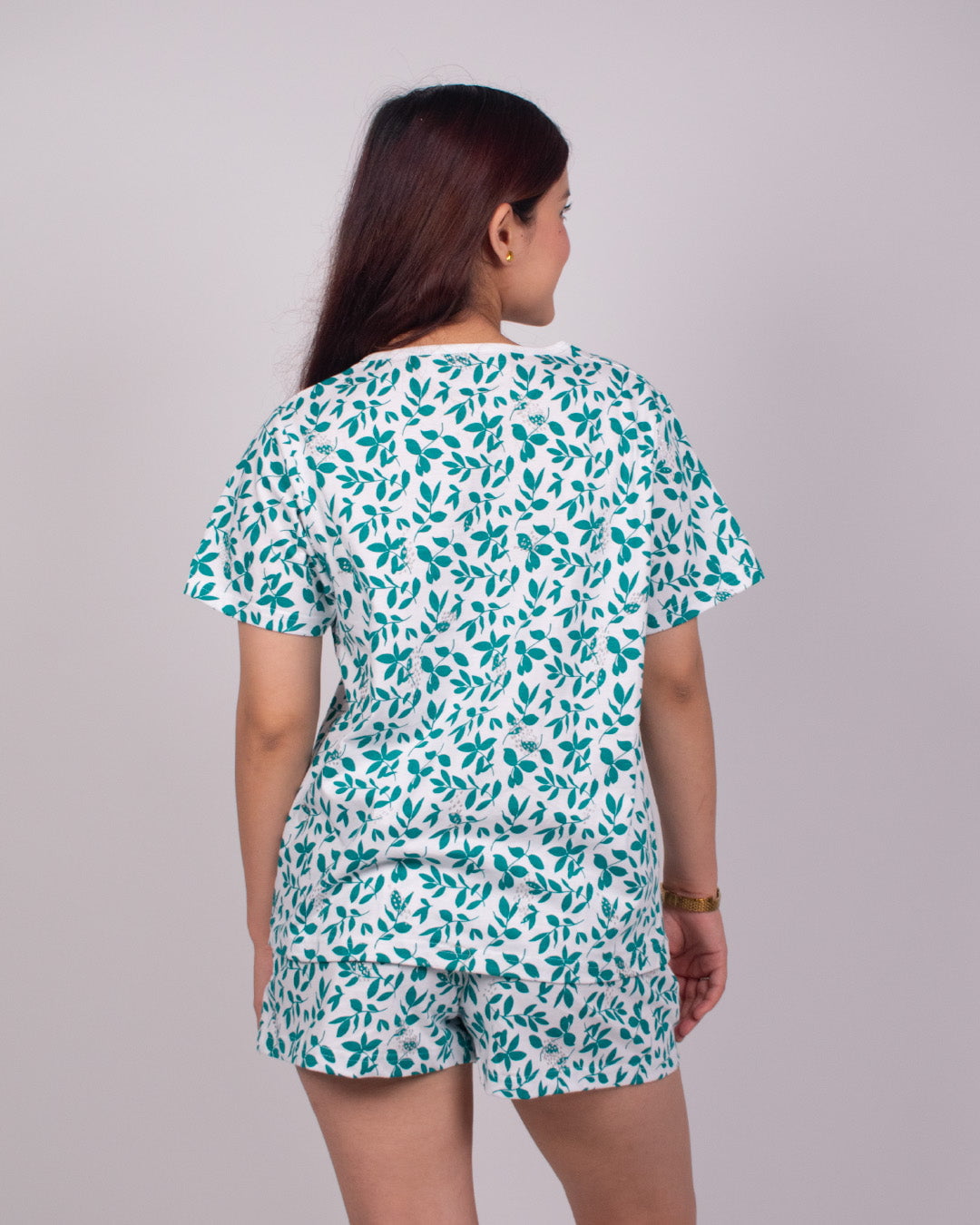 Forest Flow Cotton Shorts Set – teal leaf print on white, short-sleeve top with matching shorts, worn by model