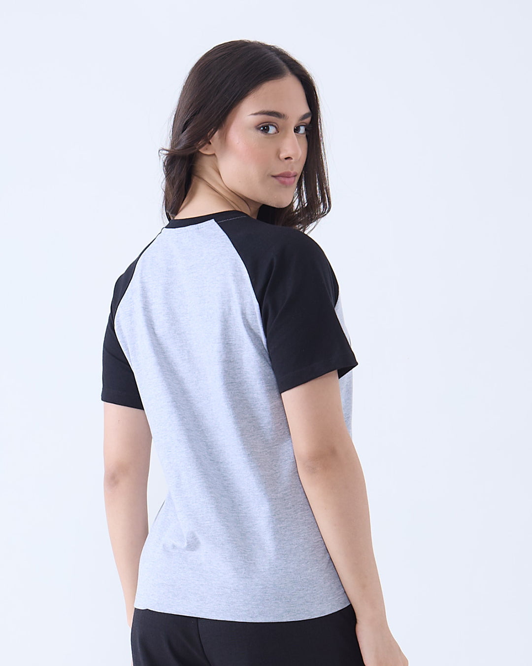 Grey New York Raglan T-Shirt from DKY – grey body with black sleeves, regular fit raglan tee worn by model