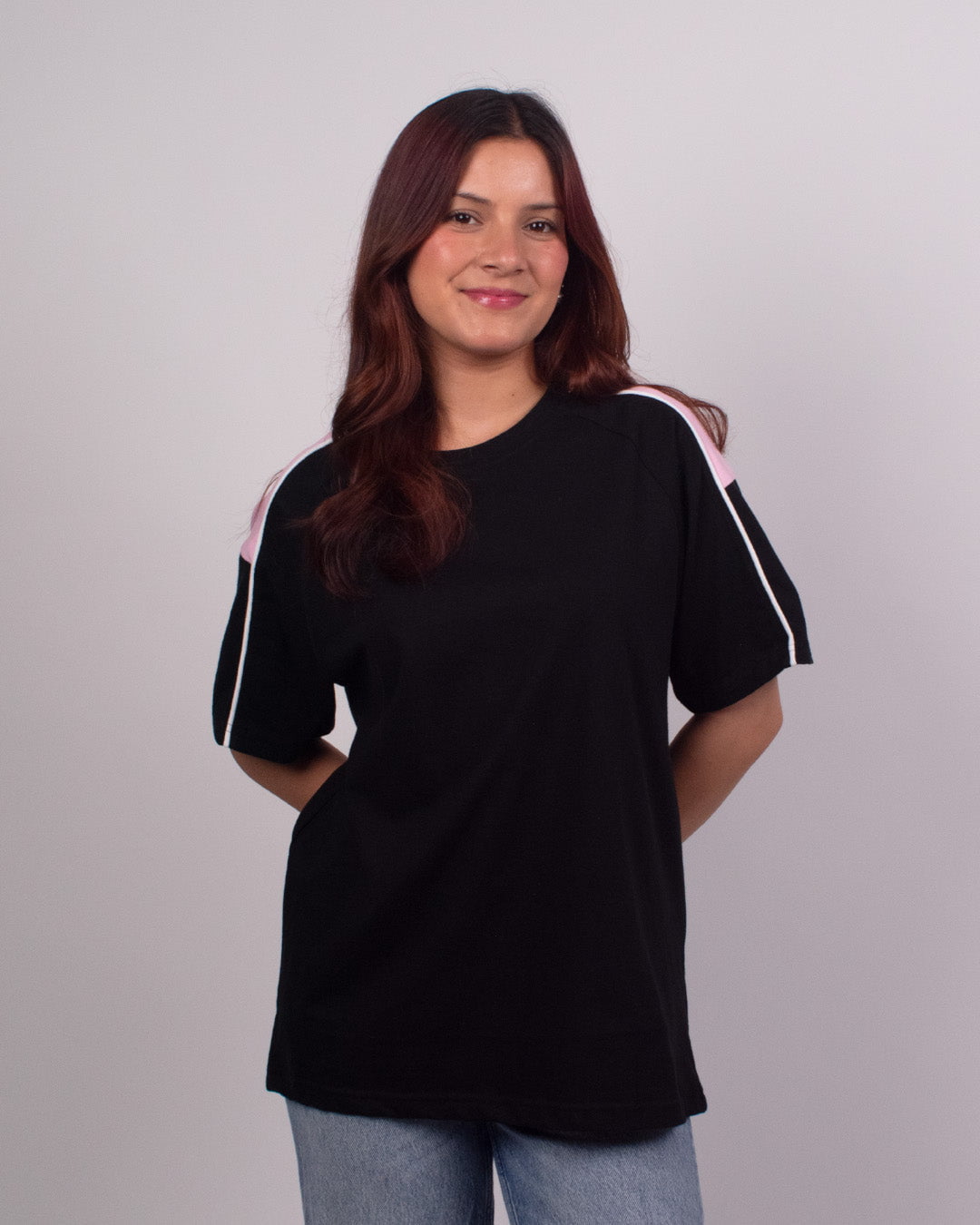 Black Downtown Plain Oversize T-Shirt – oversized raglan with pink and white sleeve stripes, worn by model