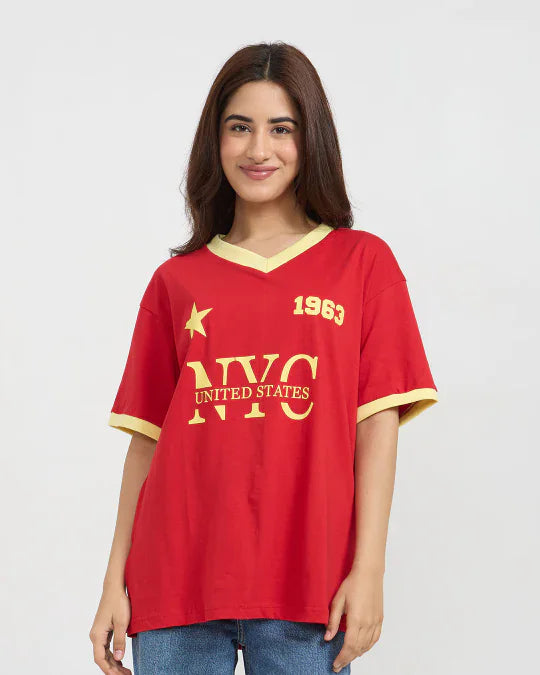 1963 Tap-Out V-Neck Oversize T-Shirt - red oversized DKY tee with yellow trim and NYC print, worn by a model