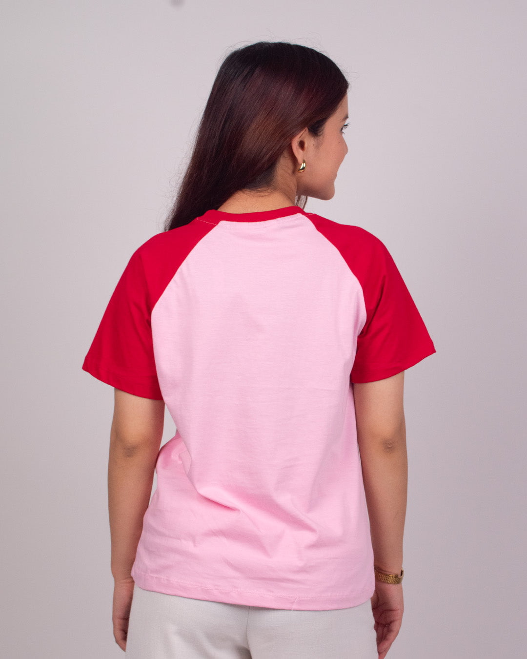 Pink Raglan Plain T‑Shirt – pink body with red raglan sleeves, worn by model