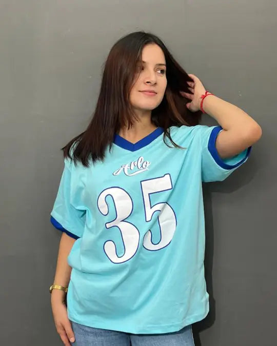35 Tap-Out V-Neck Oversize T-Shirt - turquoise oversized V-neck tee with large 35 graphic, worn by model