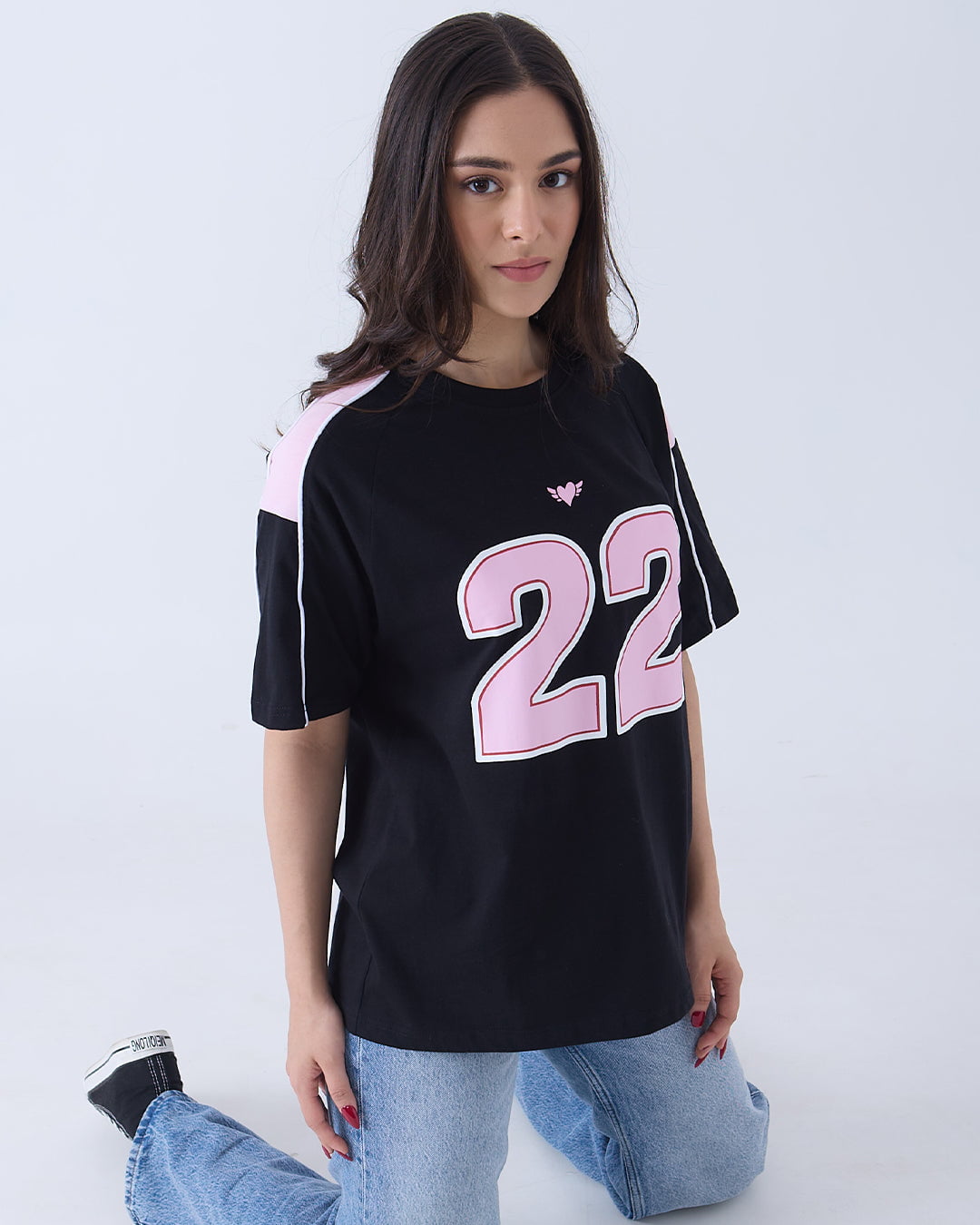 22 Downtown Oversized T-Shirt - black oversized tee with pink 22 graphic, worn by model