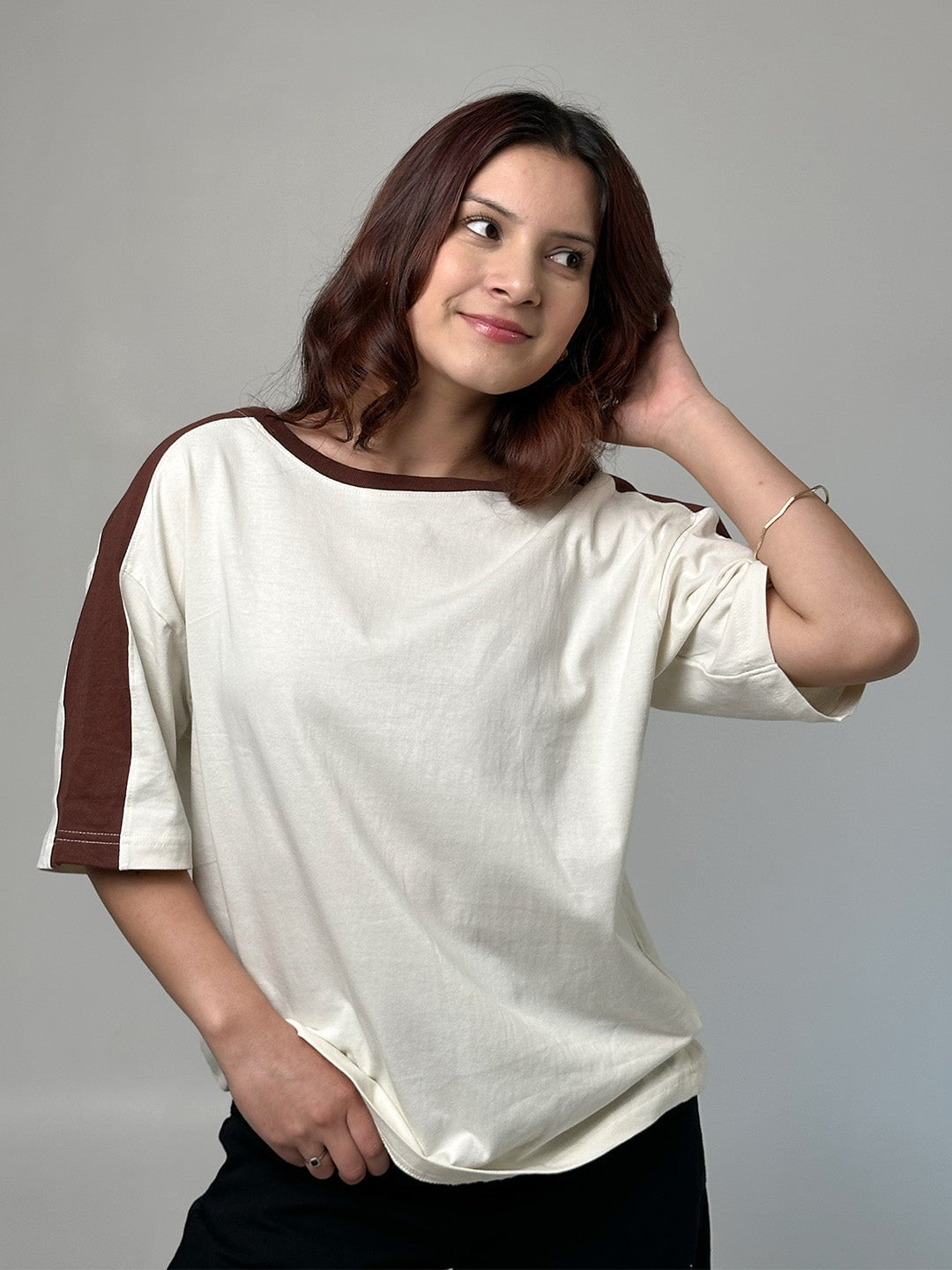 Off White Sage Oversized Raglan T-shirt – cream body with brown sleeve panel, worn by model