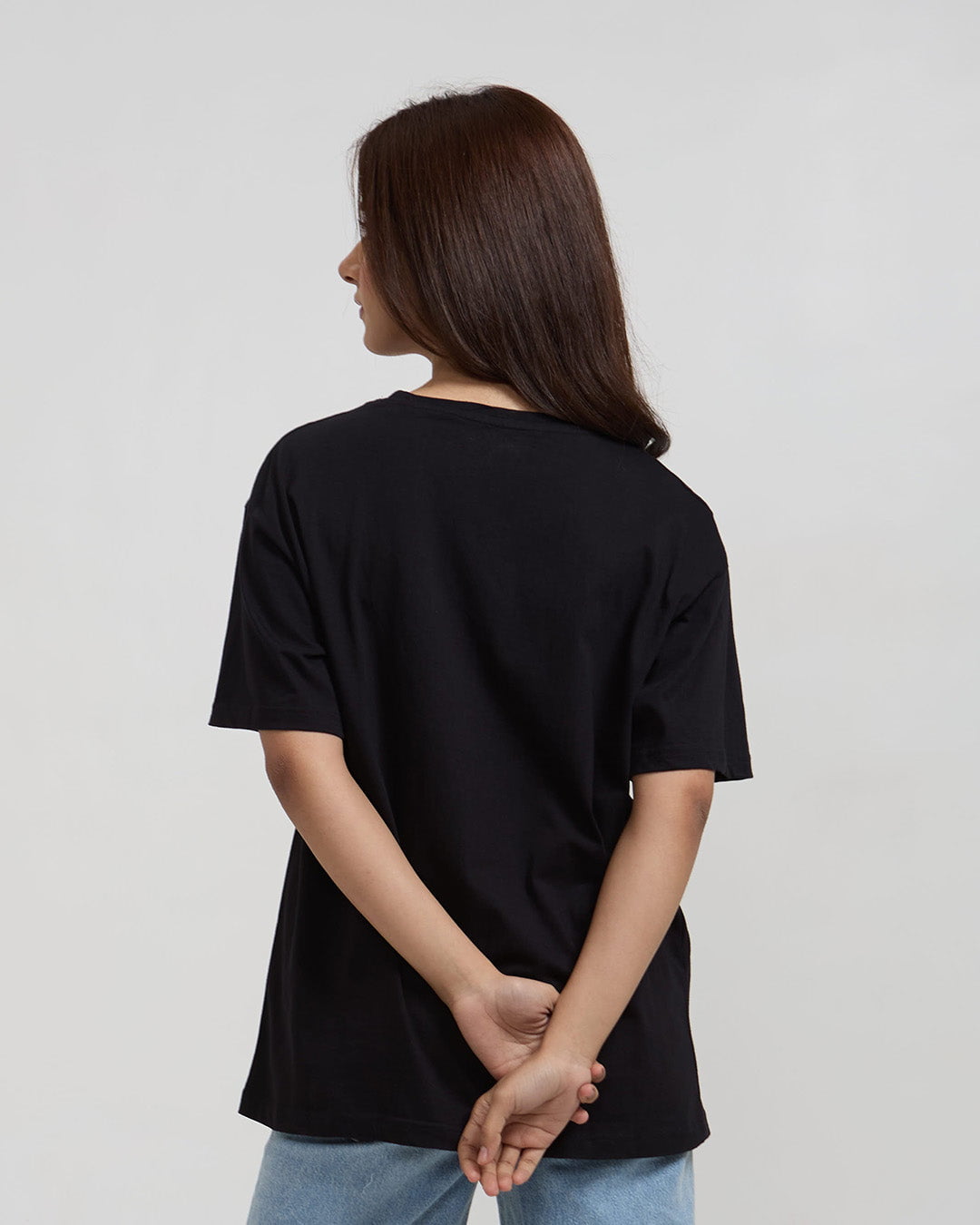 Angel Wings Oversized T-Shirt – black, oversized tee with plain design, worn by model