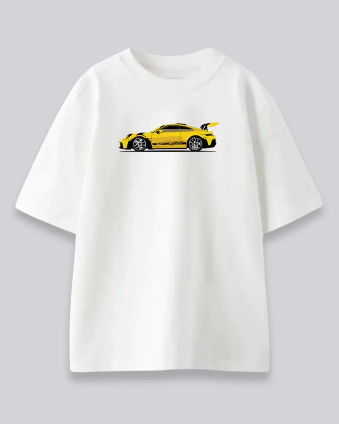 Arlo Need Money For Porsche Oversized T-Shirt – white oversized graphic tee with a yellow sports car print, shown in flat lay