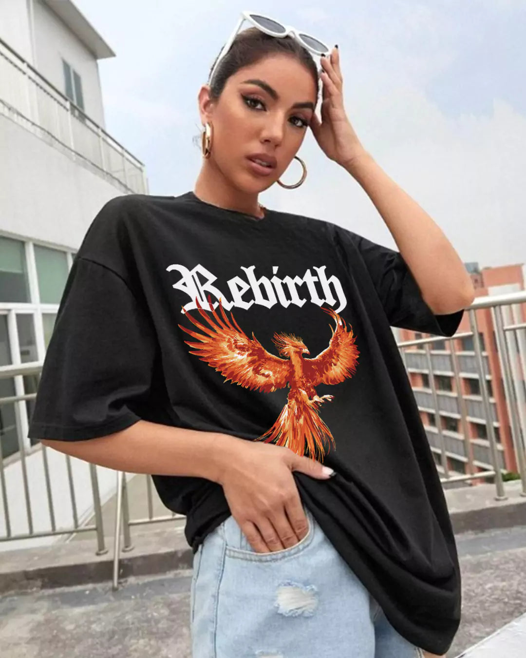 Arlo Rebirth Oversized Tshirt, black cotton tee with orange phoenix graphic and Rebirth text worn by model