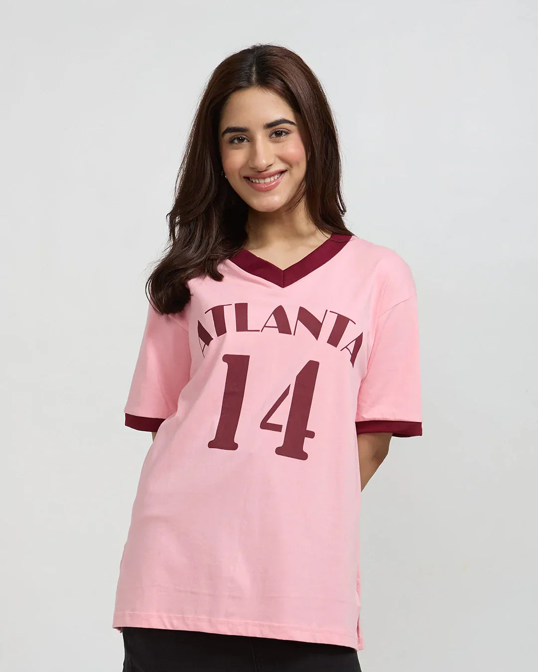Atlanta Tap-Out V-Neck Oversize T-Shirt – pink oversized tee with Atlanta 14 graphic, worn by model