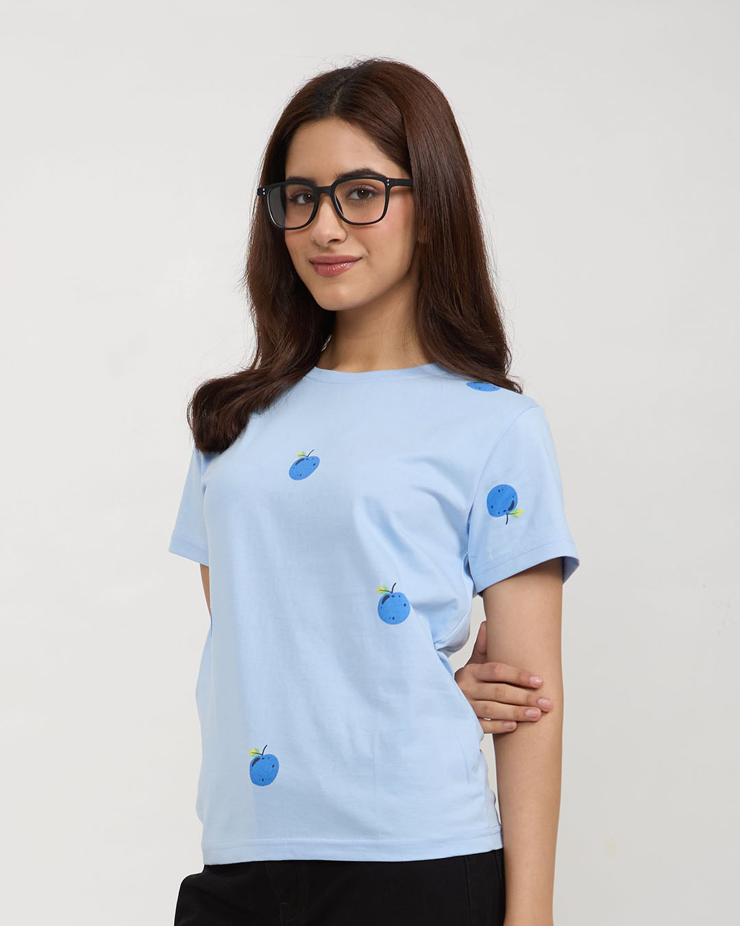 Berry T-Shirt - light blue regular tee with scattered blueberry prints, worn by model